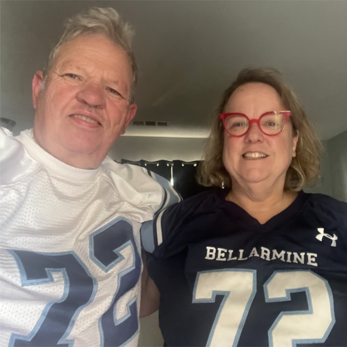 Flora and Bill wearing Mark's number 72